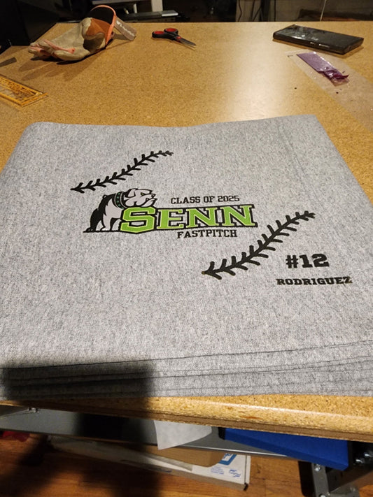 Custom embroidered Senn High School Fastpitch blanket for Class of 2025 – Chicago embroidery service.